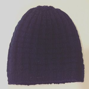 Knitted blue beanie.